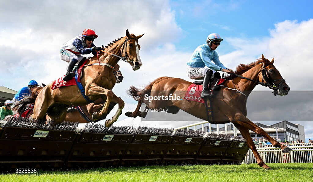 29 July 2026; Tom Mac, left, with Darragh O'Keeffe up, and Jeroboam Machin, with Donagh Meyler up, jump the first during the Tote Maiden Hurdle during day three of the Galway Races Summer Festival at Ballybrit Racecourse in Galway. Photo by Seb Daly/Sportsfile