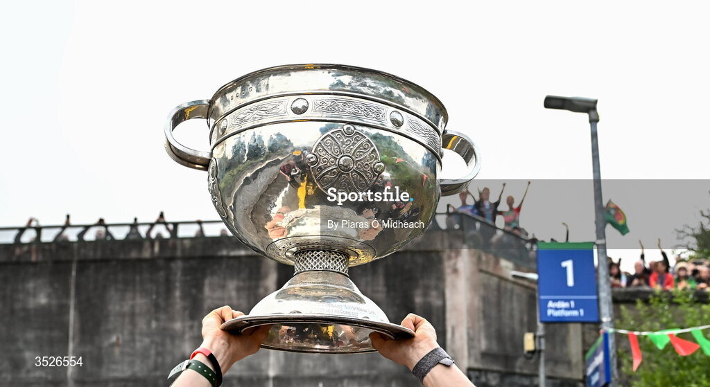 27 July 2026; Mayo captain Jack Coyne celebrates with the Sam Maguire Cup at Castlebar train station before the homecoming celebrations of the All-Ireland Senior Football Champions at Hastings Insurance MacHale Park in Castlebar, Mayo. Photo by Piaras Ó Mídheach/Sportsfile