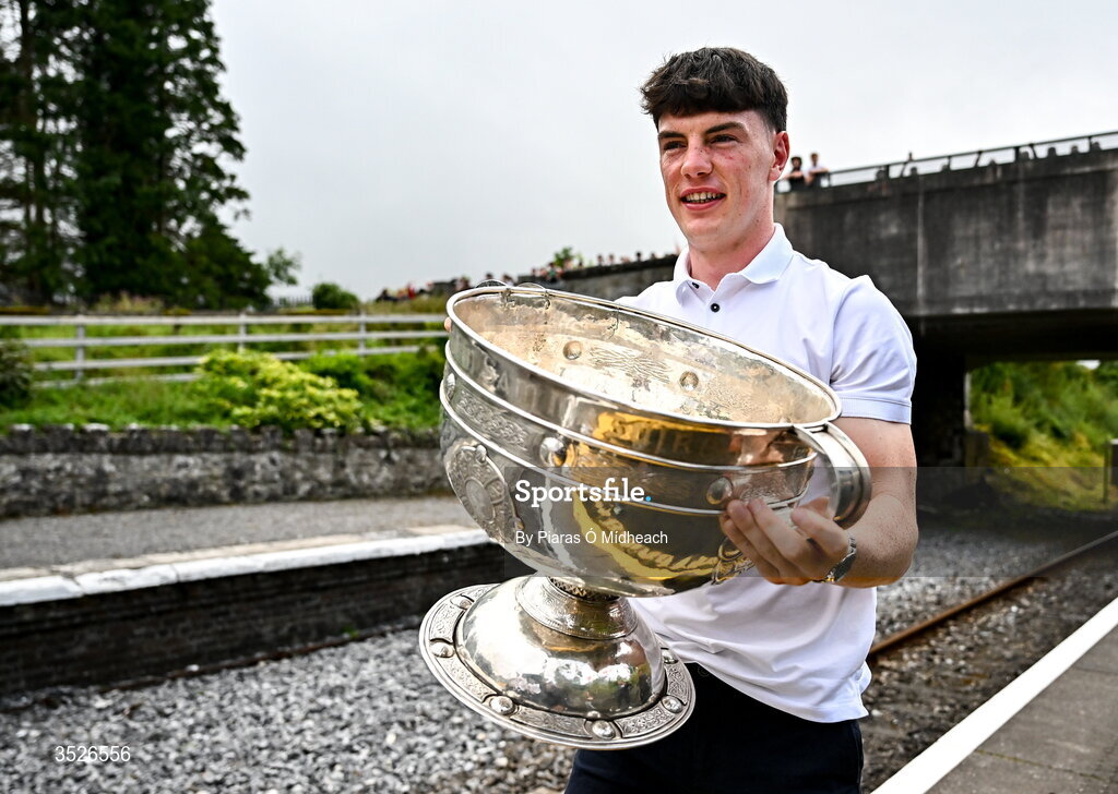 27 July 2026; Mayo footballer Bob Tuohy with the Sam Maguire Cup at Castlebar train station before the homecoming celebrations of the All-Ireland Senior Football Champions at Hastings Insurance MacHale Park in Castlebar, Mayo. Photo by Piaras Ó Mídheach/Sportsfile