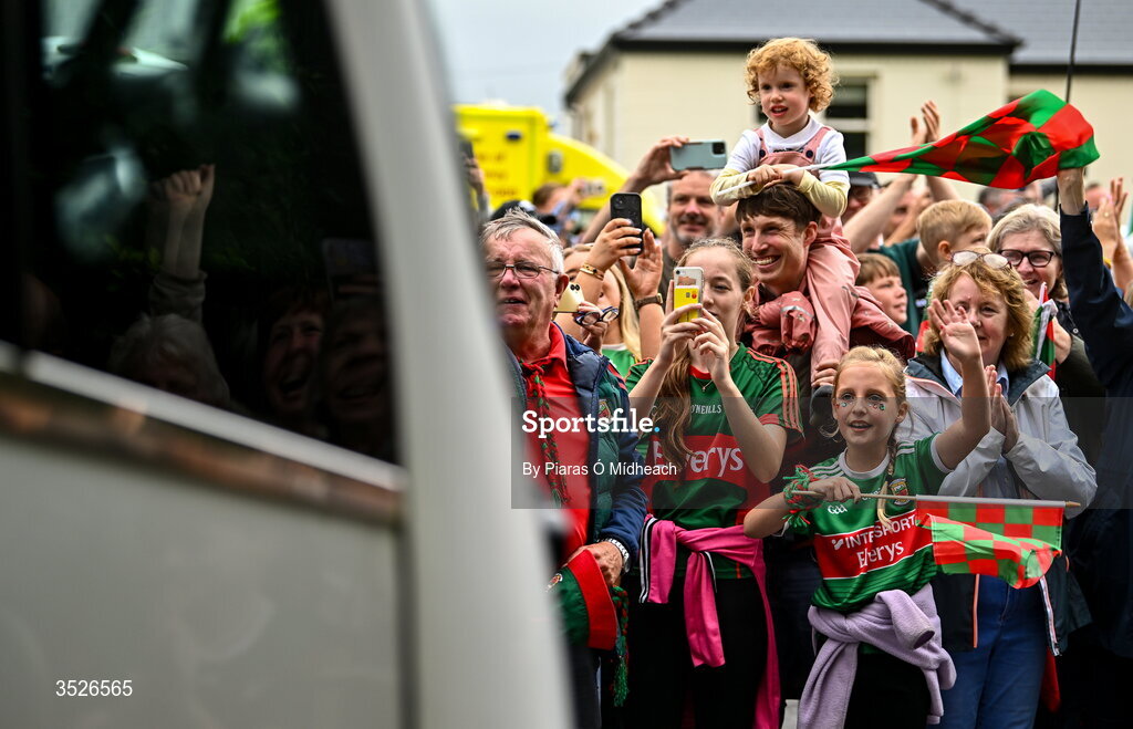 27 July 2026; Supporters cheer the Mayo team bus on the way to the homecoming celebrations of the All-Ireland Senior Football Champions at Hastings Insurance MacHale Park in Castlebar, Mayo. Photo by Piaras Ó Mídheach/Sportsfile