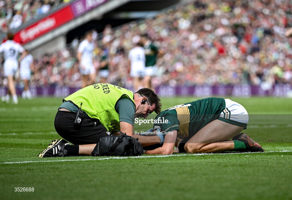 26 July 2026; David Clifford of Kerry receives medical attention from chartered physiotherapist Paudie McQuinn during the GAA Football All-Ireland Senior Championship final match between Kerry and Mayo at Croke Park in Dublin. Photo by Stephen McCarthy/Sportsfile