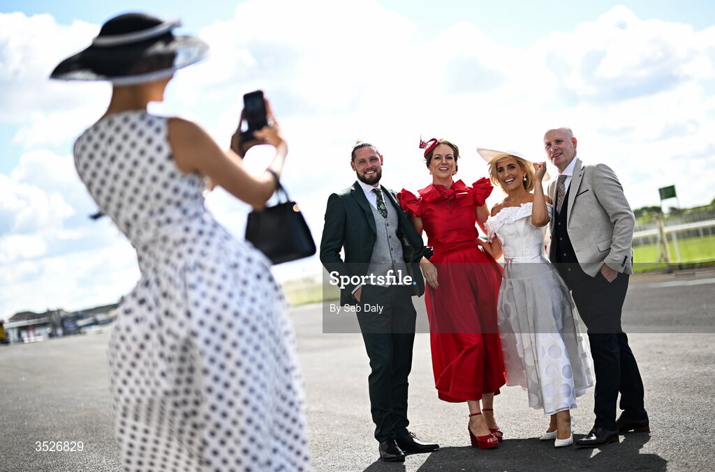 30 July 2026; Racegoers, from left, former Mayo inter-county footballer Pádraig O’Hora, and Niamh O'Grady, from Ballina, Mayo, with Charlene Flanagan and Micheál Jone, from Enniscrone, Sligo, during day four of the Galway Races Summer Festival at Ballybrit Racecourse in Galway. Photo by Seb Daly/Sportsfile