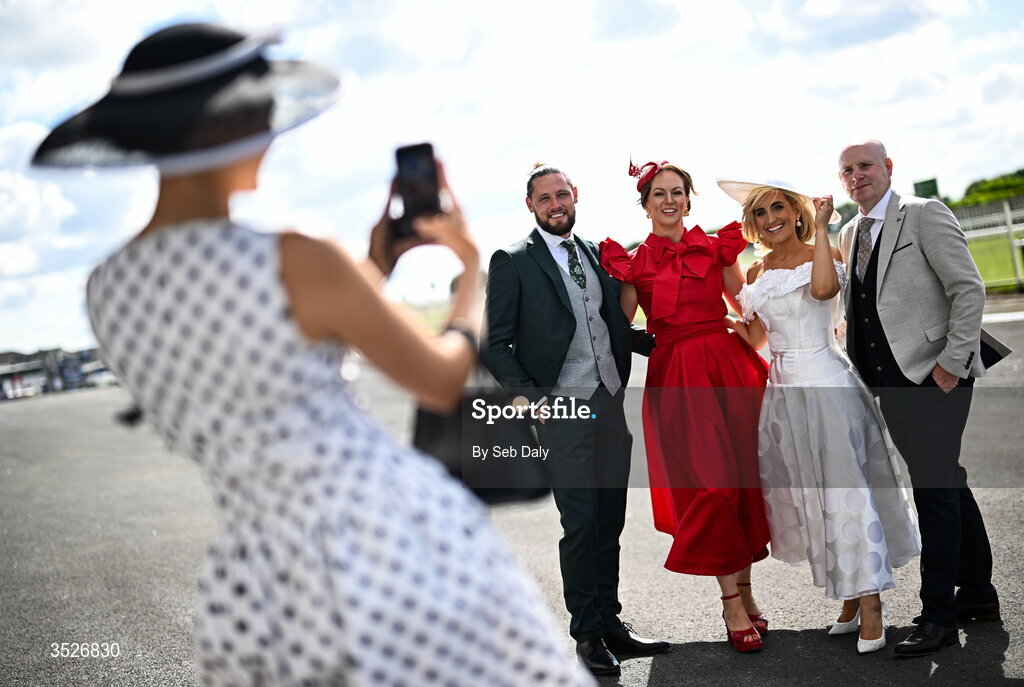 30 July 2026; Racegoers, from left, former Mayo inter-county footballer Pádraig O’Hora, and Niamh O'Grady, from Ballina, Mayo, with Charlene Flanagan and Micheál Jone, from Enniscrone, Sligo, during day four of the Galway Races Summer Festival at Ballybrit Racecourse in Galway. Photo by Seb Daly/Sportsfile