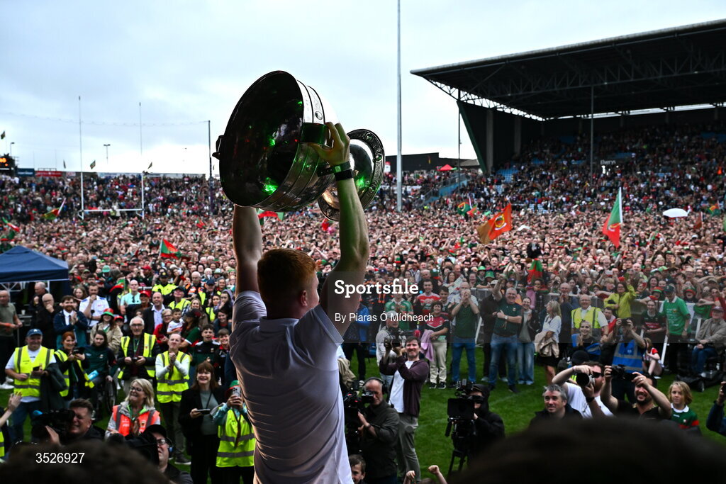 27 July 2026; Mayo footballer Darragh Beirne lifts the Sam Maguire Cup during the homecoming celebrations of the All-Ireland Senior Football Champions at Hastings Insurance MacHale Park in Castlebar, Mayo. Photo by Piaras Ó Mídheach/Sportsfile