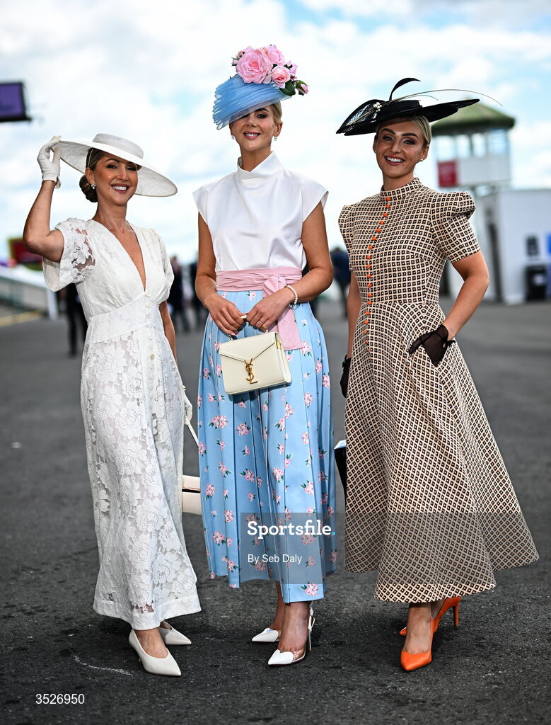 30 July 2026; Racegoers, from left, Siobhan Cronin, from Newcastle West, Limerick, Jenny Ryan, from Roscommon, and Lisa Walsh, from Meath, during day four of the Galway Races Summer Festival at Ballybrit Racecourse in Galway. Photo by Seb Daly/Sportsfile