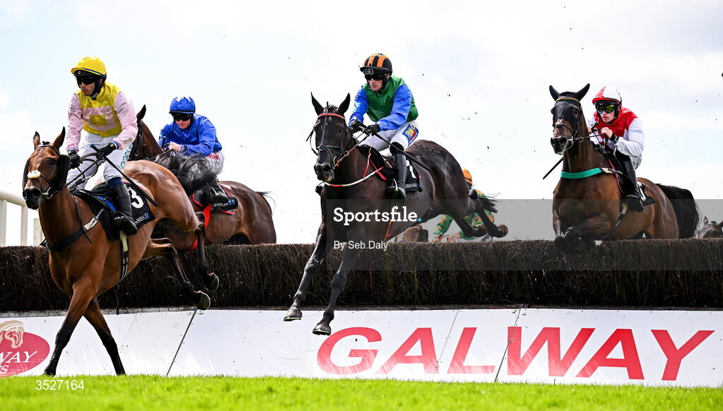 30 July 2026; Shadow Paddy, centre, with Gary Noonan up, on their way to winning the Guinness Open Gate Brewery Novice Steeplechase during day four of the Galway Races Summer Festival at Ballybrit Racecourse in Galway. Photo by Seb Daly/Sportsfile