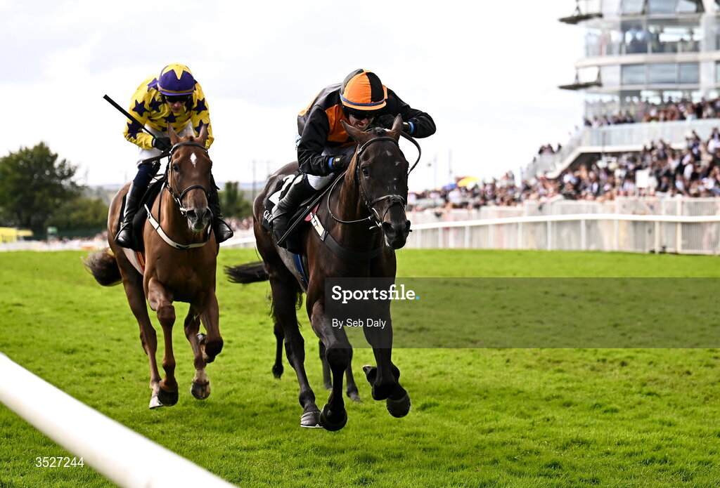 30 July 2026; Midnight Jet, right, with Darragh O'Keeffe up, on their way to winning the Guinness Novice Hurdle, from second place Roc Dino, left, with Paul Townend up, during day four of the Galway Races Summer Festival at Ballybrit Racecourse in Galway. Photo by Seb Daly/Sportsfile