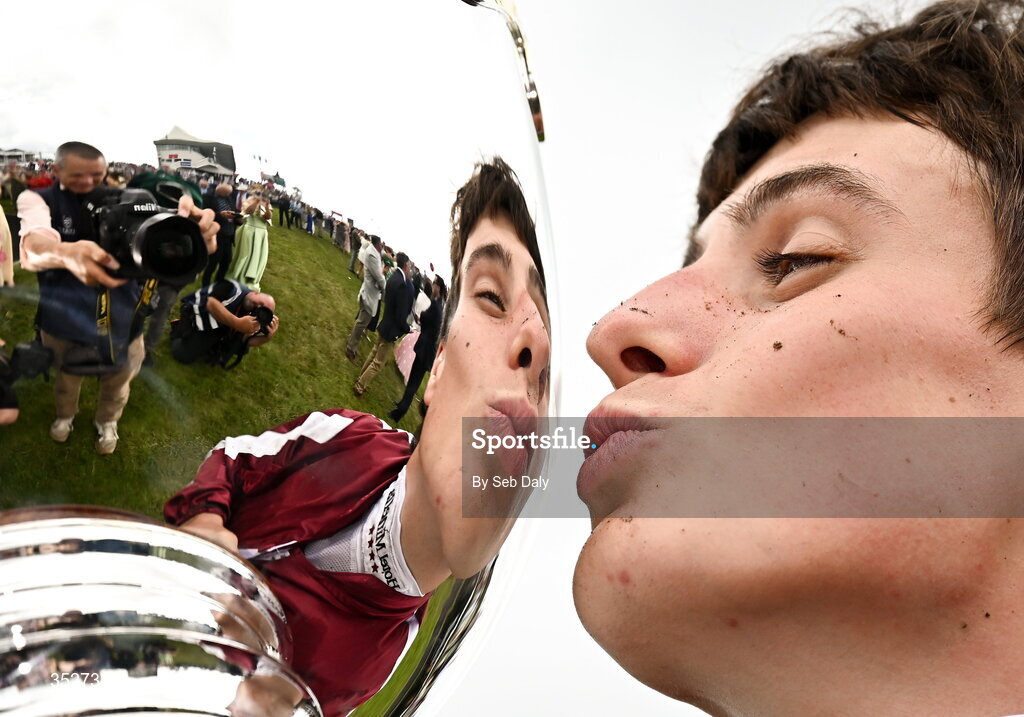 30 July 2026; Jockey Daniel King kisses the trophy after winning the Guinness Galway Hurdle Handicap on Putapoundinthejar during day four of the Galway Races Summer Festival at Ballybrit Racecourse in Galway. Photo by Seb Daly/Sportsfile