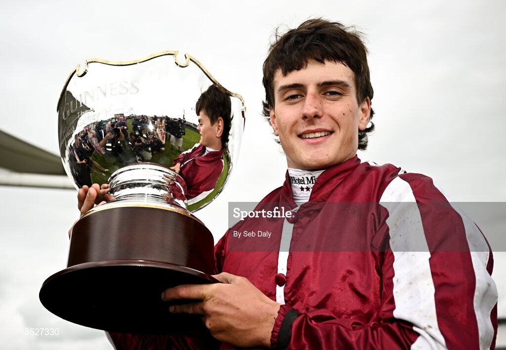 30 July 2026; Jockey Daniel King with the trophy after winning the Guinness Galway Hurdle Handicap on Putapoundinthejar during day four of the Galway Races Summer Festival at Ballybrit Racecourse in Galway. Photo by Seb Daly/Sportsfile