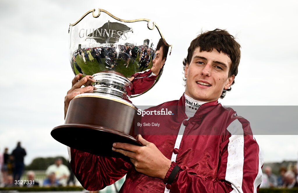 30 July 2026; Jockey Daniel King with the trophy after winning the Guinness Galway Hurdle Handicap Putapoundinthejar during day four of the Galway Races Summer Festival at Ballybrit Racecourse in Galway. Photo by Seb Daly/Sportsfile