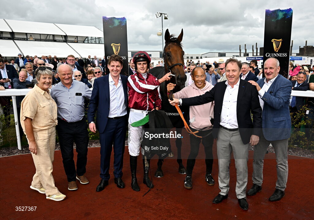 30 July 2026; Winning connections, including jockey Daniel King, owner Ray Grehan, and trainer Tony Martin, after sending out Putapoundinthejar to win the Guinness Galway Hurdle Handicap during day four of the Galway Races Summer Festival at Ballybrit Racecourse in Galway. Photo by Seb Daly/Sportsfile