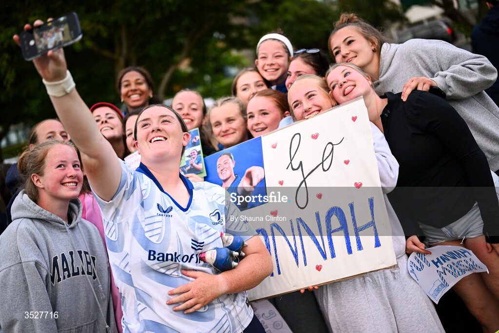 30 July 2026; Hannah Wilson with supporters after an Leinster rugby women open training session at Kings Hospital School in Dublin. Photo by Shauna Clinton/Sportsfile