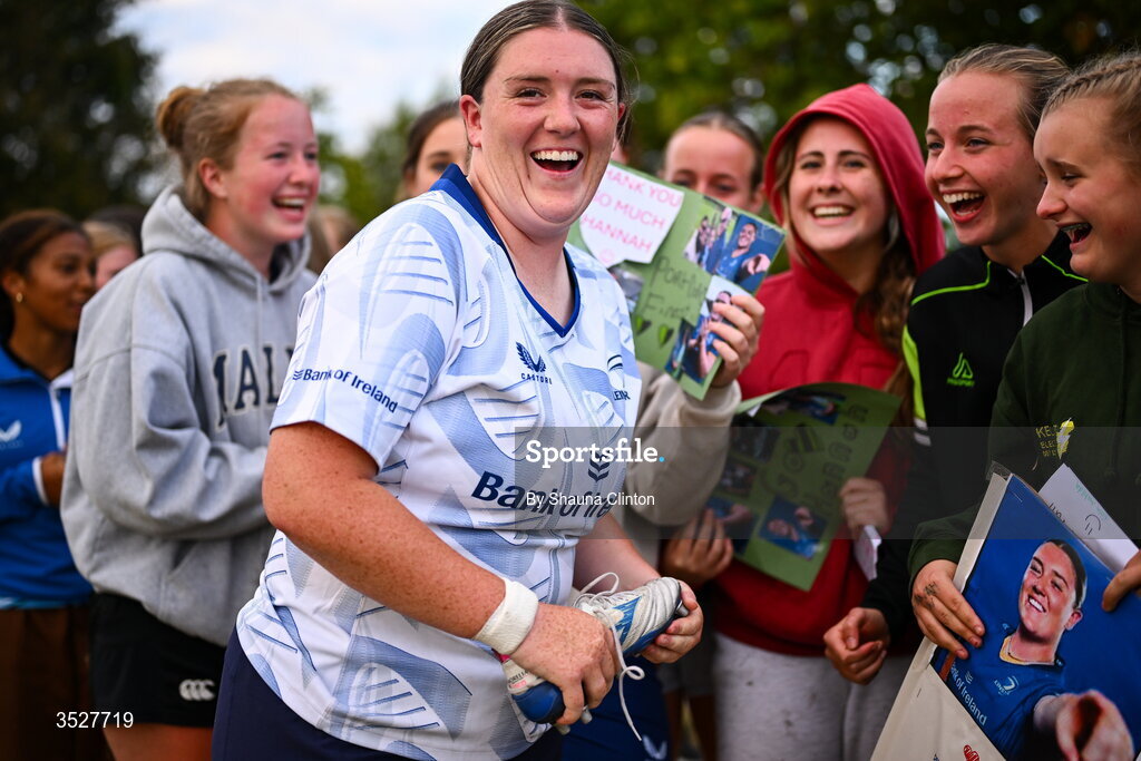 30 July 2026; Hannah Wilson with supporters after an Leinster rugby women open training session at Kings Hospital School in Dublin. Photo by Shauna Clinton/Sportsfile