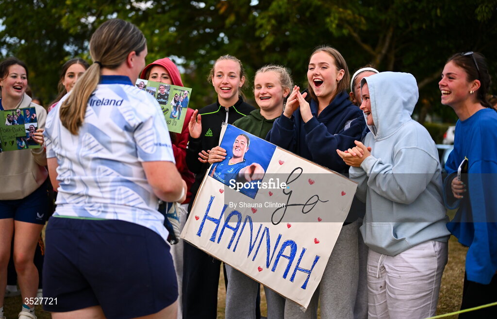 30 July 2026; Hannah Wilson with supporters after an Leinster rugby women open training session at Kings Hospital School in Dublin. Photo by Shauna Clinton/Sportsfile