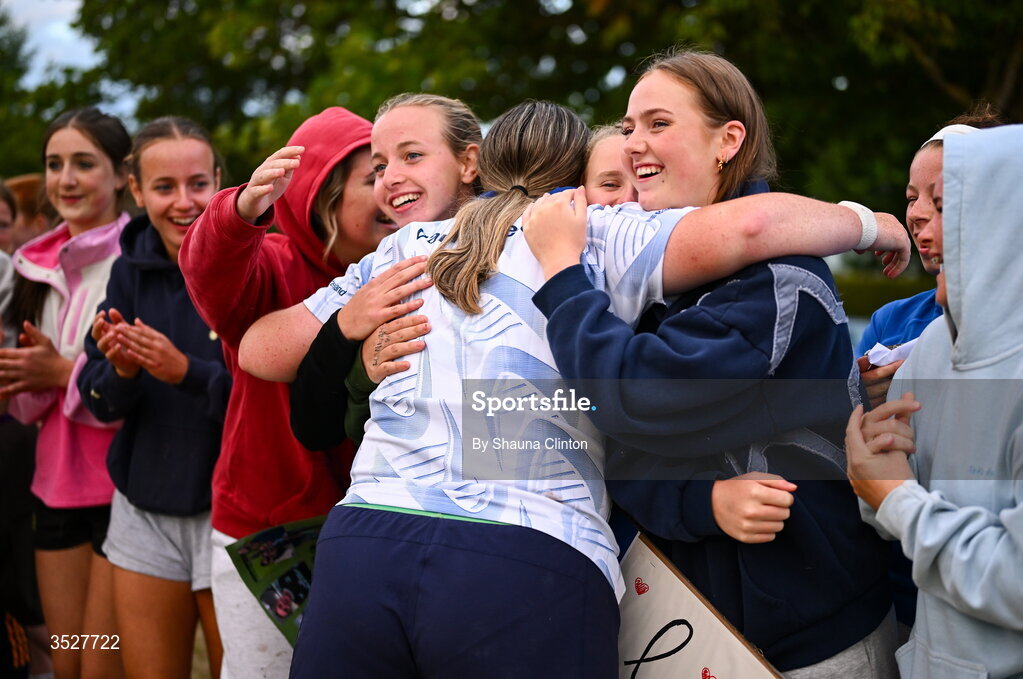 30 July 2026; Hannah Wilson with supporters after an Leinster rugby women open training session at Kings Hospital School in Dublin. Photo by Shauna Clinton/Sportsfile