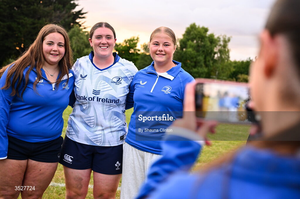 30 July 2026; Hannah Wilson with supporters after an Leinster rugby women open training session at Kings Hospital School in Dublin. Photo by Shauna Clinton/Sportsfile