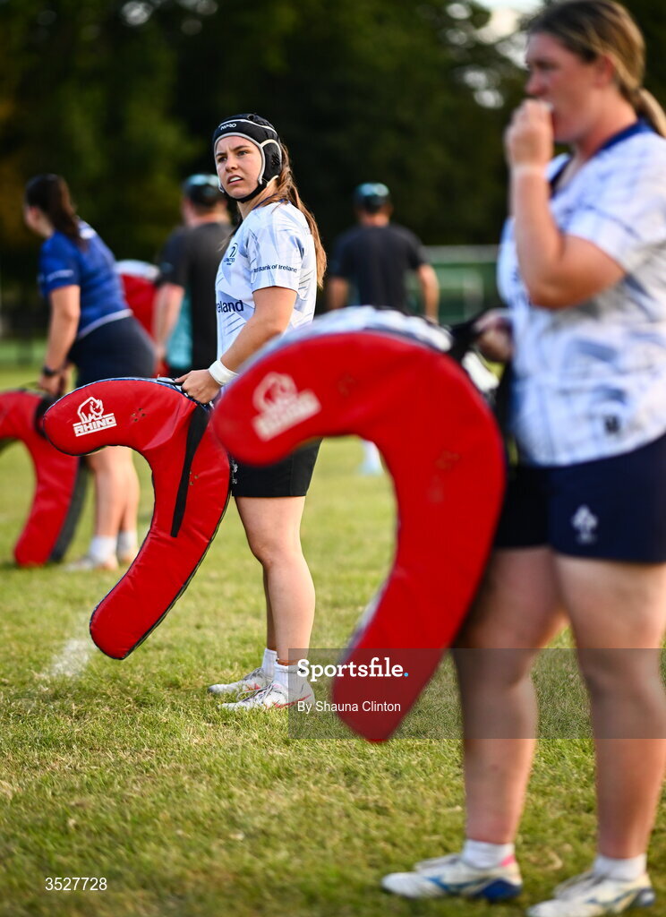 30 July 2026; Sarah Delaney, centre, and team-mates during an Leinster rugby women open training session at Kings Hospital School in Dublin. Photo by Shauna Clinton/Sportsfile