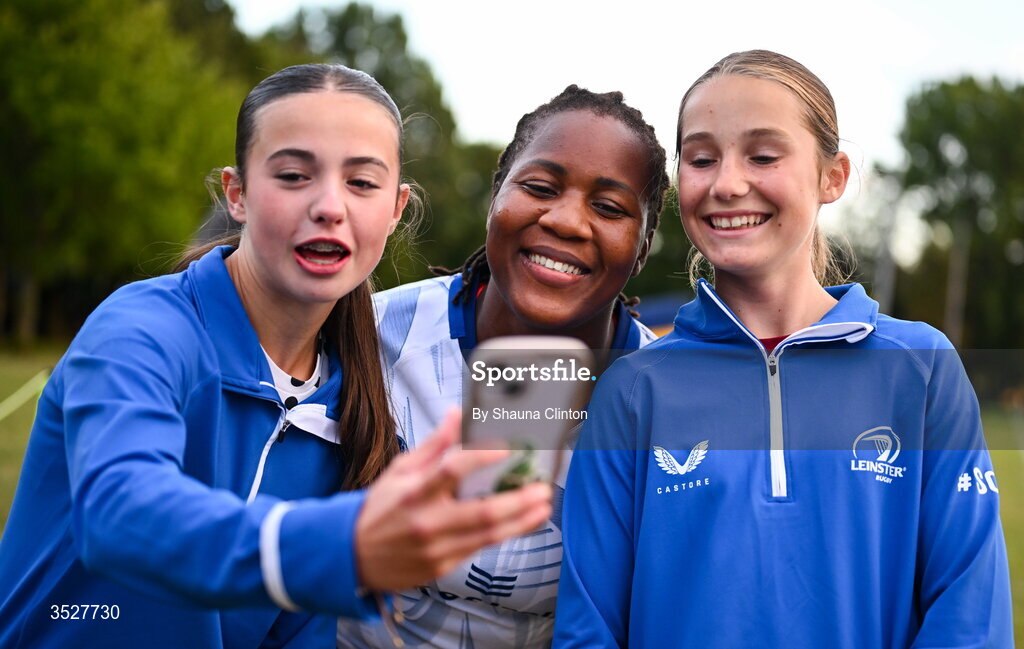 30 July 2026; Linda Djougang with supporters after an Leinster rugby women open training session at Kings Hospital School in Dublin. Photo by Shauna Clinton/Sportsfile