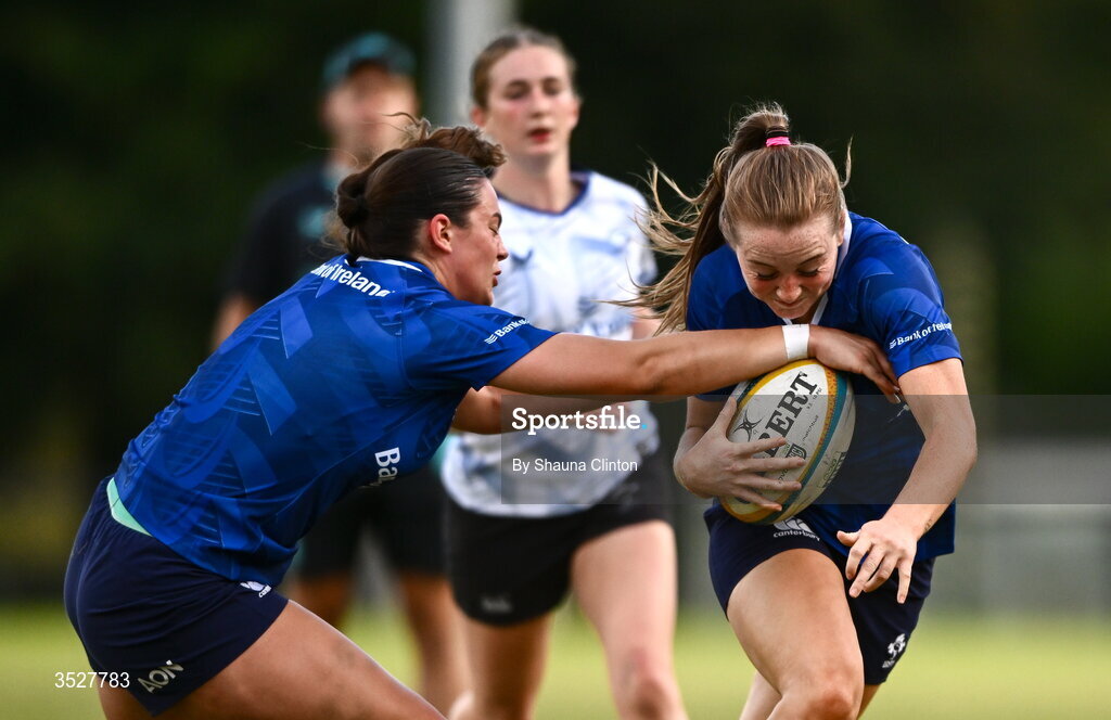30 July 2026; Amy Larn, right, is tackled by Leah Tarpey during an Leinster rugby women open training session at Kings Hospital School in Dublin. Photo by Shauna Clinton/Sportsfile