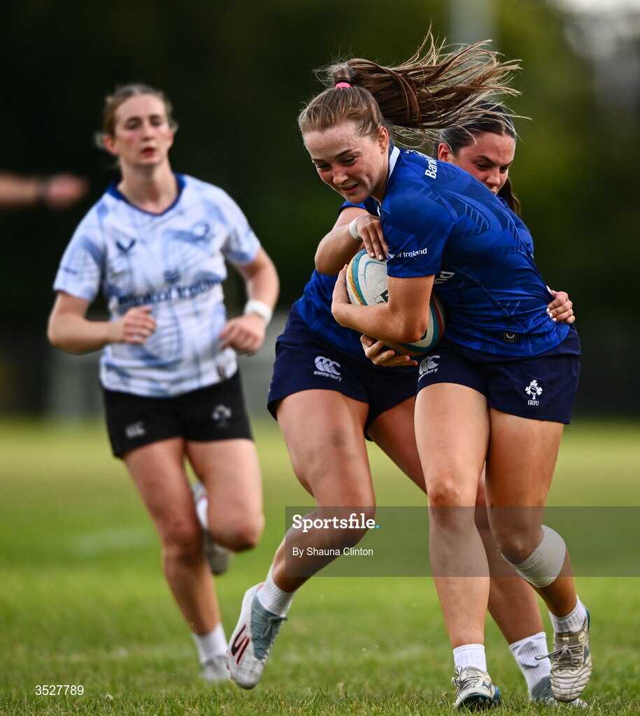 30 July 2026; Amy Larn, right, is tackled by Leah Tarpey during an Leinster rugby women open training session at Kings Hospital School in Dublin. Photo by Shauna Clinton/Sportsfile