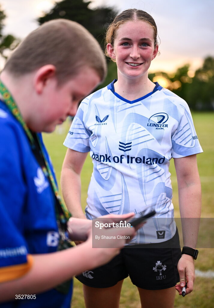 30 July 2026; Ellie O'Sullivan-Sexton with supporters after an Leinster rugby women open training session at Kings Hospital School in Dublin. Photo by Shauna Clinton/Sportsfile