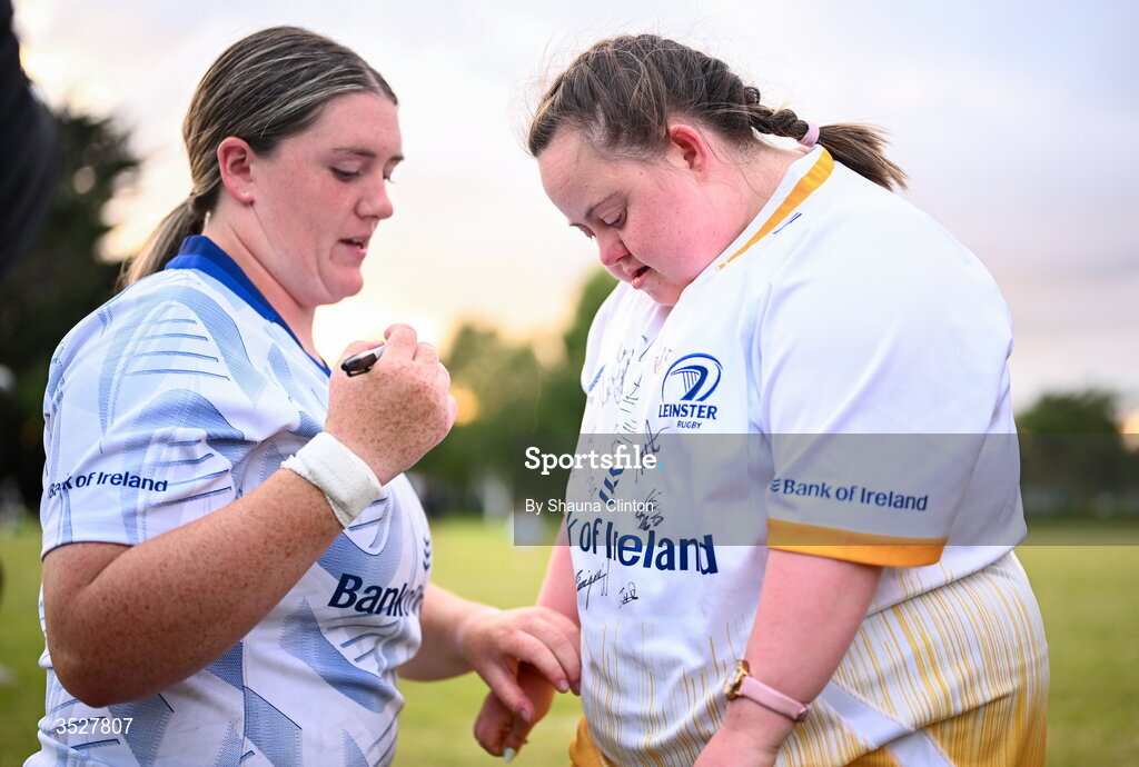 30 July 2026; Hannah Wilson with supporter Jenny Malone after an Leinster rugby women open training session at Kings Hospital School in Dublin. Photo by Shauna Clinton/Sportsfile