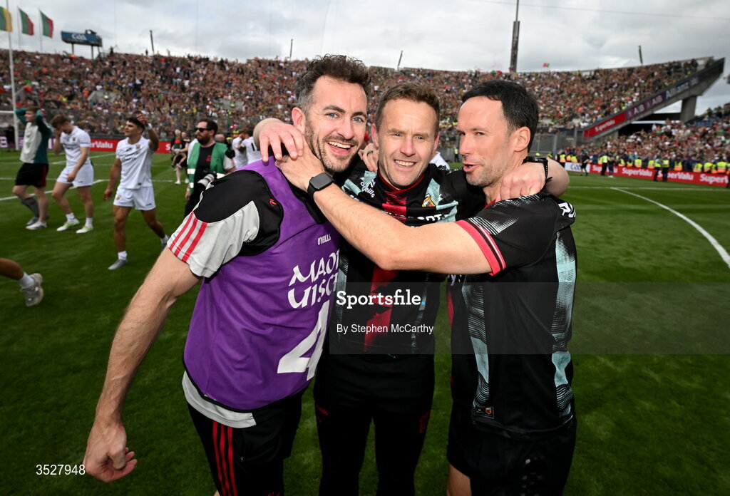 26 July 2026; Mayo manager Andy Moran, centre, celebrates with strength and conditioning coaches David Drake, left, and Barry Solan following the GAA Football All-Ireland Senior Championship final match between Kerry and Mayo at Croke Park in Dublin. Photo by Stephen McCarthy/Sportsfile