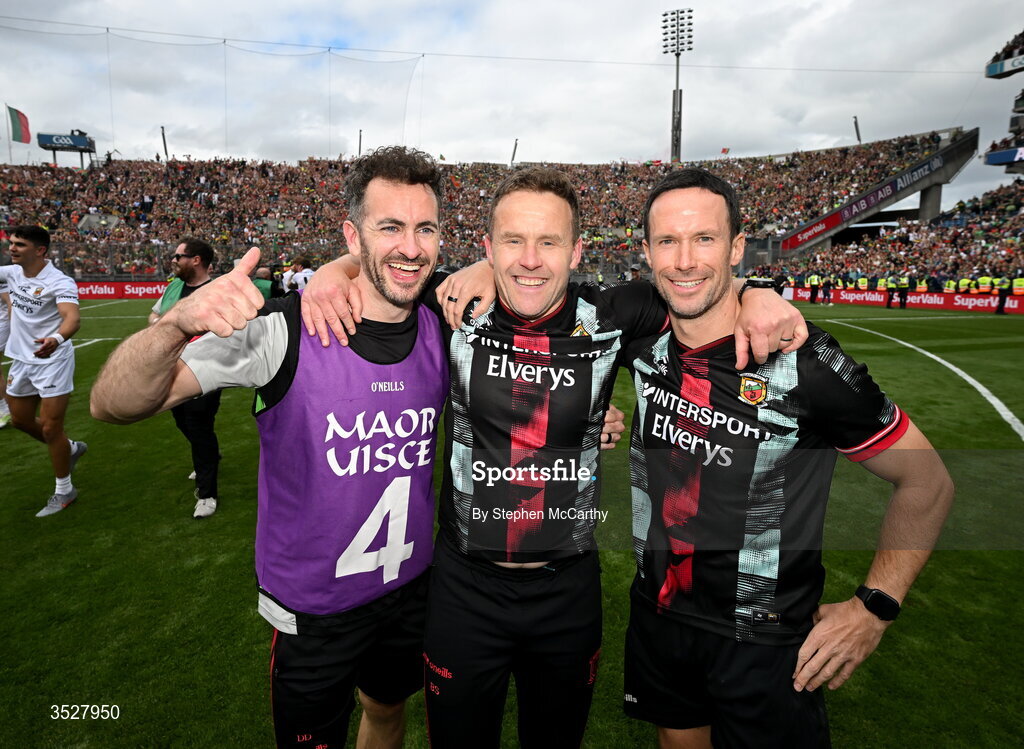 26 July 2026; Mayo manager Andy Moran, centre, celebrates with strength and conditioning coaches David Drake, left, and Barry Solan following the GAA Football All-Ireland Senior Championship final match between Kerry and Mayo at Croke Park in Dublin. Photo by Stephen McCarthy/Sportsfile