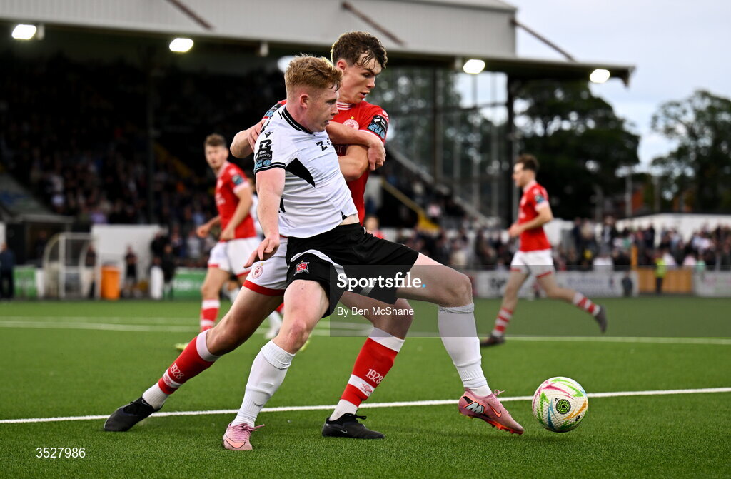 31 July 2026; Cian Dillon of Dundalk in action against Gareth McElroy of Sligo Rovers during the SSE Airtricity Premier Division match between Dundalk and Sligo Rovers at Oriel Park in Dundalk, Louth. Photo by Ben McShane/Sportsfile