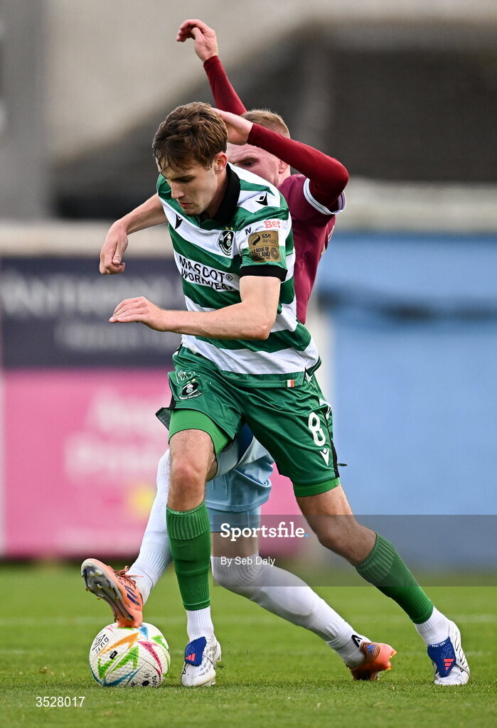 31 July 2026; Matt Healy of Shamrock Rovers is tackled by Mark Doyle of Drogheda United during the SSE Airtricity Men’s Premier Division match between Drogheda United and Shamrock Rovers at Sullivan & Lambe Park in Drogheda, Louth. Photo by Seb Daly/Sportsfile