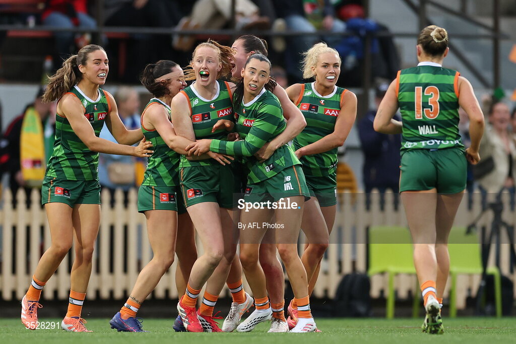 1 August 2026; Blaithin Bogue of Ireland, centre, celebrates with team-mates Aishling Moloney, left, and Orla O'Dwyer after scoring a goal during the AFLW test match between Australia and Ireland at the North Sydney Oval in Sydney, Australia. Photo by Darrian Traynor/Getty Images/AFL Photos via Sportsfile