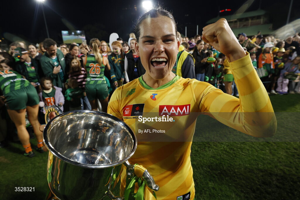 1 August 2026; Sophie Conway of Australia celebrates with the cup after victory in the AFLW test match between Australia and Ireland at the North Sydney Oval in Sydney, Australia. Photo by Darrian Traynor/Getty Images/AFL Photos via Sportsfile