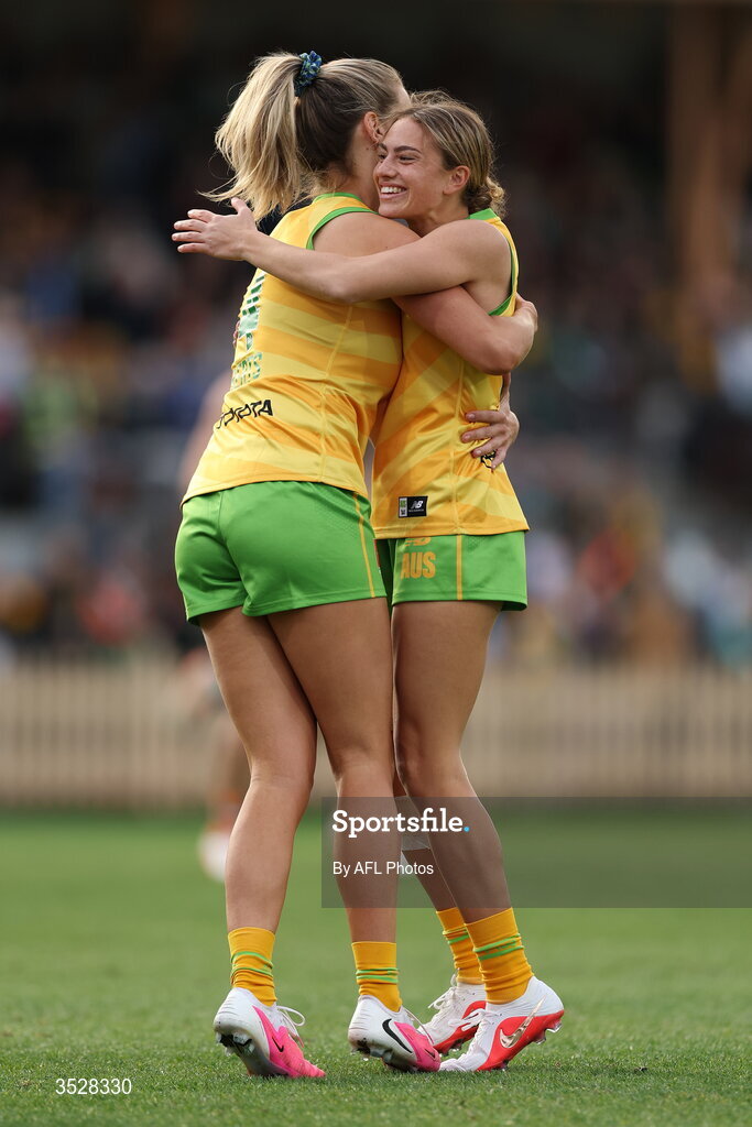 1 August 2026; Zippy Fish of Australia, right, celebrates with team-mate Ella Roberts after scoring a goal during the AFLW test match between Australia and Ireland at the North Sydney Oval in Sydney, Australia. Photo by Darrian Traynor/Getty Images/AFL Photos via Sportsfile