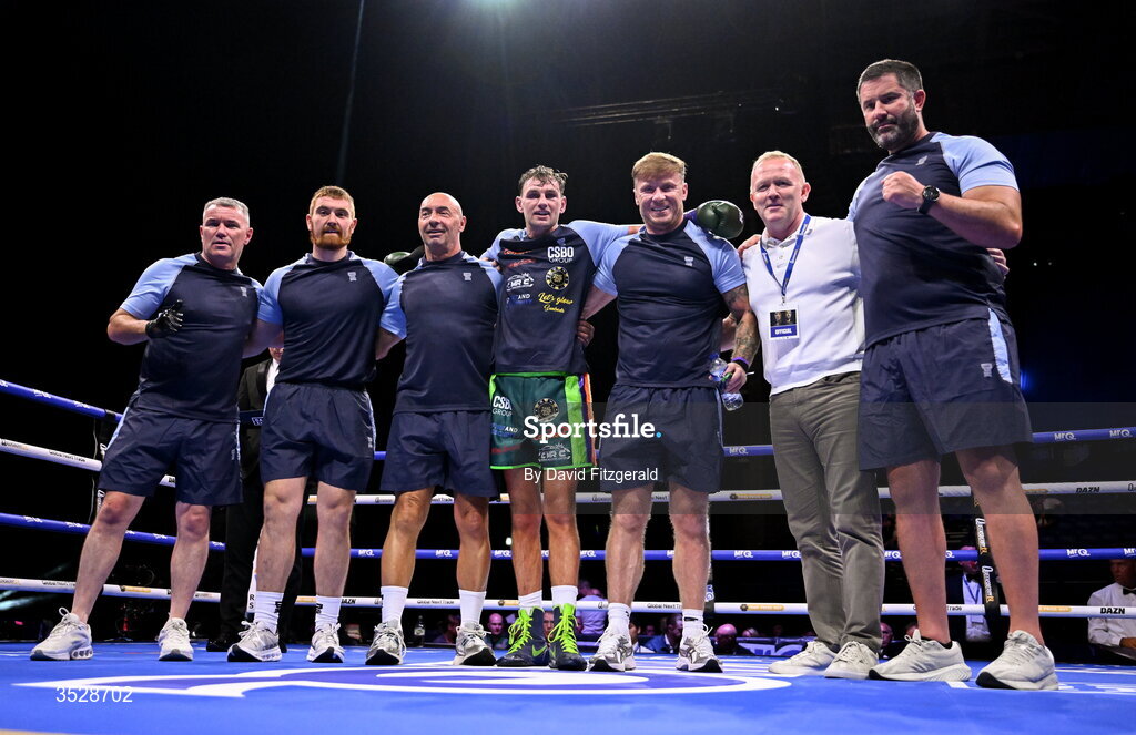 1 August 2026; Sean McComb, centre, celebrates with his team including Pete Taylor, father of Katie Taylor, third from left, after being delcared victorious against Miguel Cesario Antin after their super lightweight bout during the Boxing in Dublin event at the 3Arena in Dublin. Photo by David Fitzgerald/Sportsfile