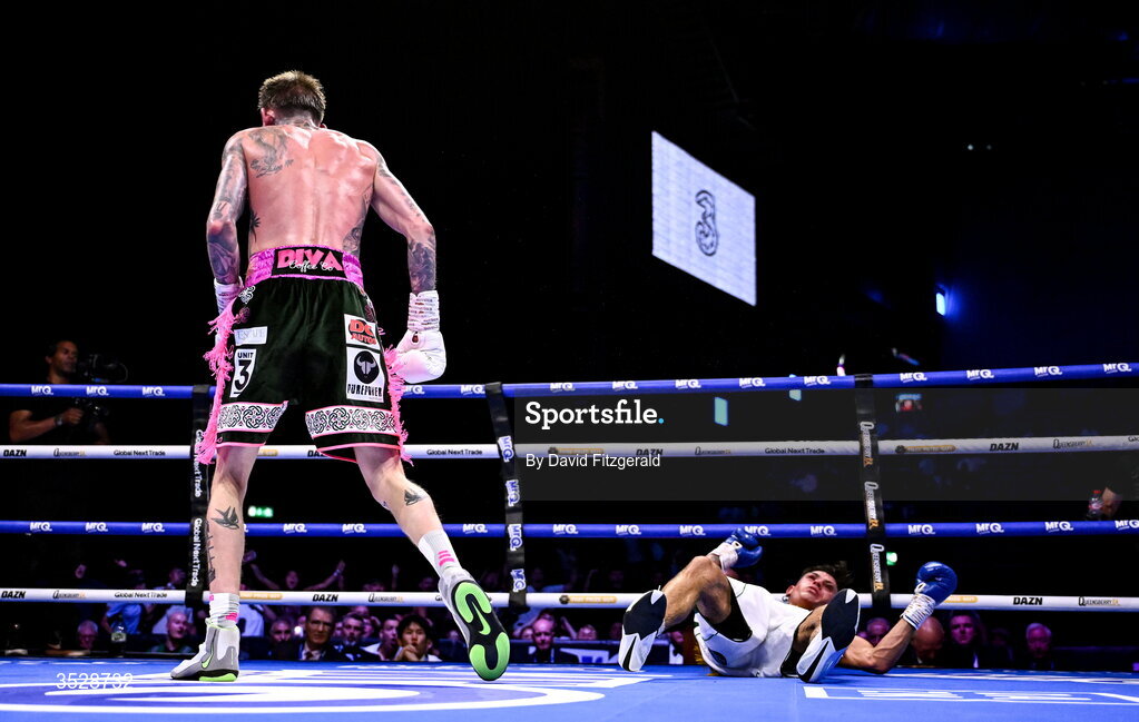 1 August 2026; Gary Cully, left, after knocking down Lee Reeves during their BUI Irish Super Lightweight Title bout during their BUI Irish Super Lightweight Title bout during the Boxing in Dublin event at the 3Arena in Dublin. Photo by David Fitzgerald/Sportsfile