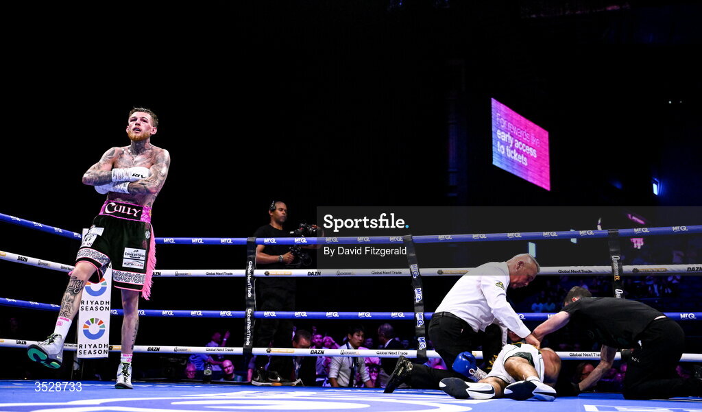 1 August 2026; Gary Cully, left, after knocking down Lee Reeves during their BUI Irish Super Lightweight Title bout during their BUI Irish Super Lightweight Title bout during the Boxing in Dublin event at the 3Arena in Dublin. Photo by David Fitzgerald/Sportsfile