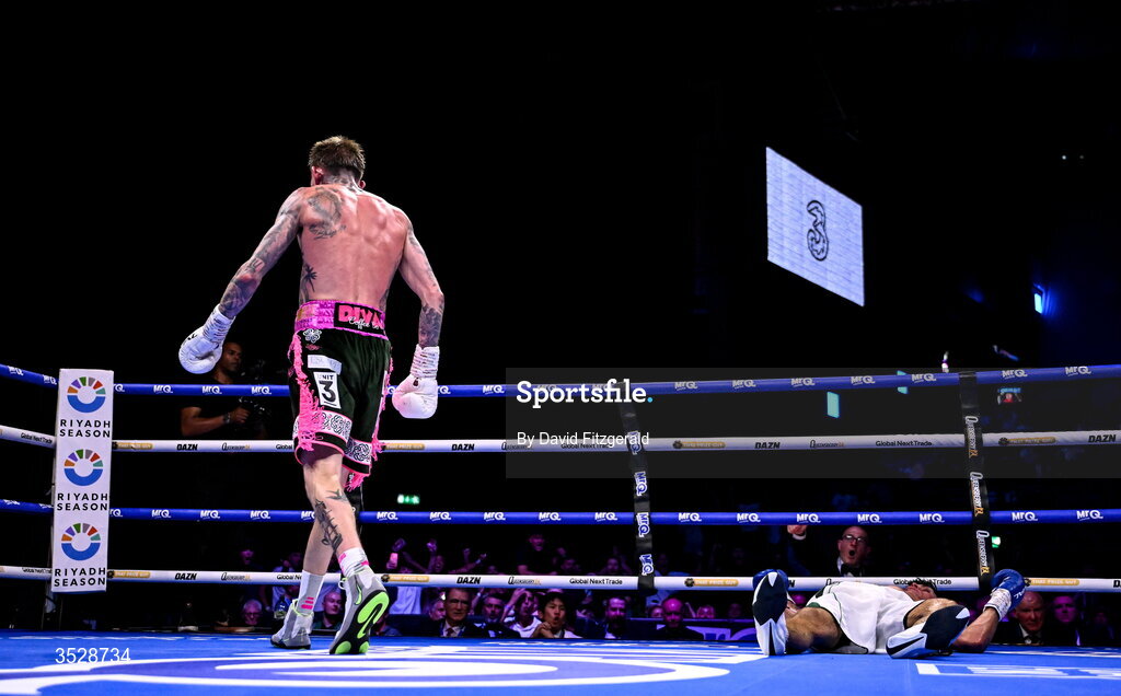 1 August 2026; Gary Cully, left, after knocking down Lee Reeves during their BUI Irish Super Lightweight Title bout during their BUI Irish Super Lightweight Title bout during the Boxing in Dublin event at the 3Arena in Dublin. Photo by David Fitzgerald/Sportsfile