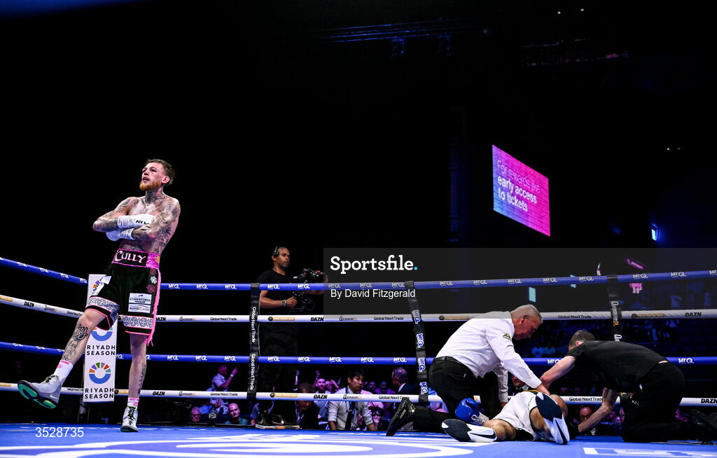 1 August 2026; Gary Cully, left, after knocking down Lee Reeves during their BUI Irish Super Lightweight Title bout during their BUI Irish Super Lightweight Title bout during the Boxing in Dublin event at the 3Arena in Dublin. Photo by David Fitzgerald/Sportsfile