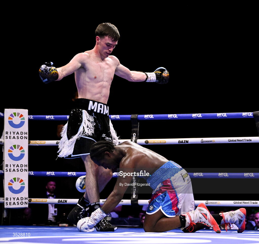 1 August 2026; Bobbi Flood, left, after knocking down Tariq Davis during their super welterweight bout during the Boxing in Dublin event at the 3Arena in Dublin. Photo by David Fitzgerald/Sportsfile
