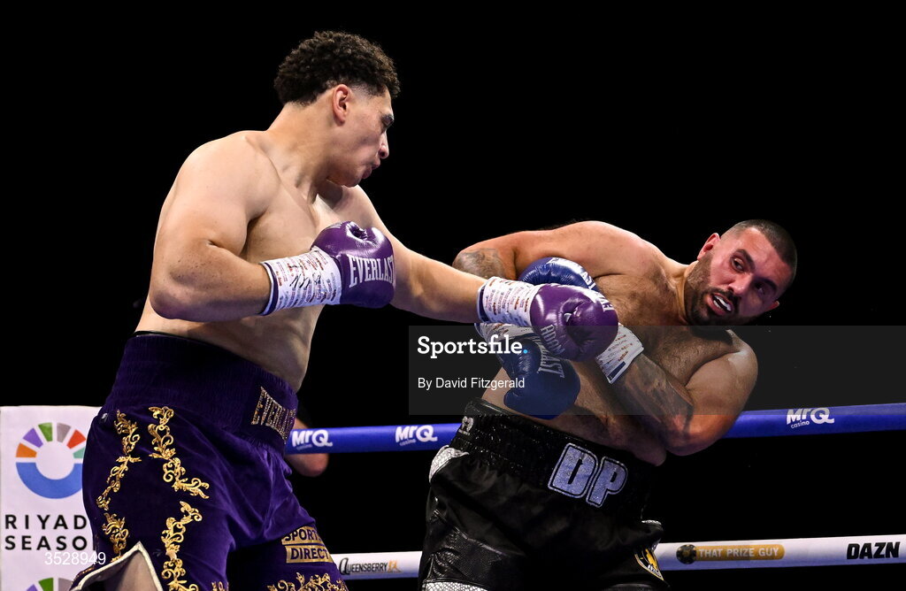 1 August 2026; Adam Olaniyan, left, in action against Deepak Pathak during their heavyweight bout during the Boxing in Dublin event at the 3Arena in Dublin. Photo by David Fitzgerald/Sportsfile