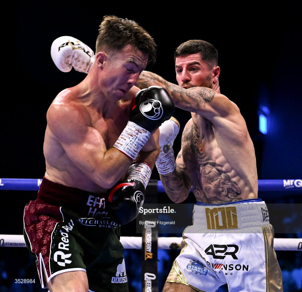 1 August 2026; Mark Chamberlain, left, knocks down Pierce O'Leary during their IBO World Super Lightweight Title bout during the Boxing in Dublin event at the 3Arena in Dublin. Photo by David Fitzgerald/Sportsfile