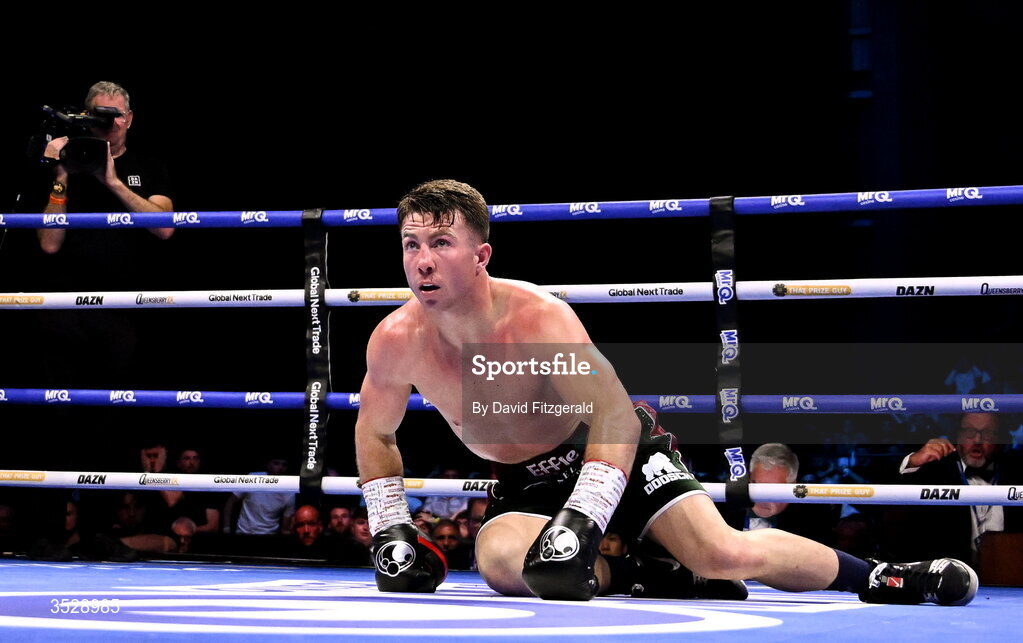 1 August 2026;  Pierce O'Leary reacts after being knocked down by Mark Chamberlain during their IBO World Super Lightweight Title bout during the Boxing in Dublin event at the 3Arena in Dublin. Photo by David Fitzgerald/Sportsfile