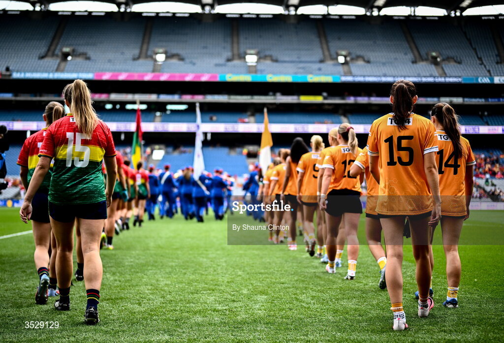 2 August 2026; Players from both teams walk in the parade ahead of the LGFA TG4 All-Ireland Junior Championship final match between Antrim and Carlow at Croke Park in Dublin. Photo by Shauna Clinton/Sportsfile