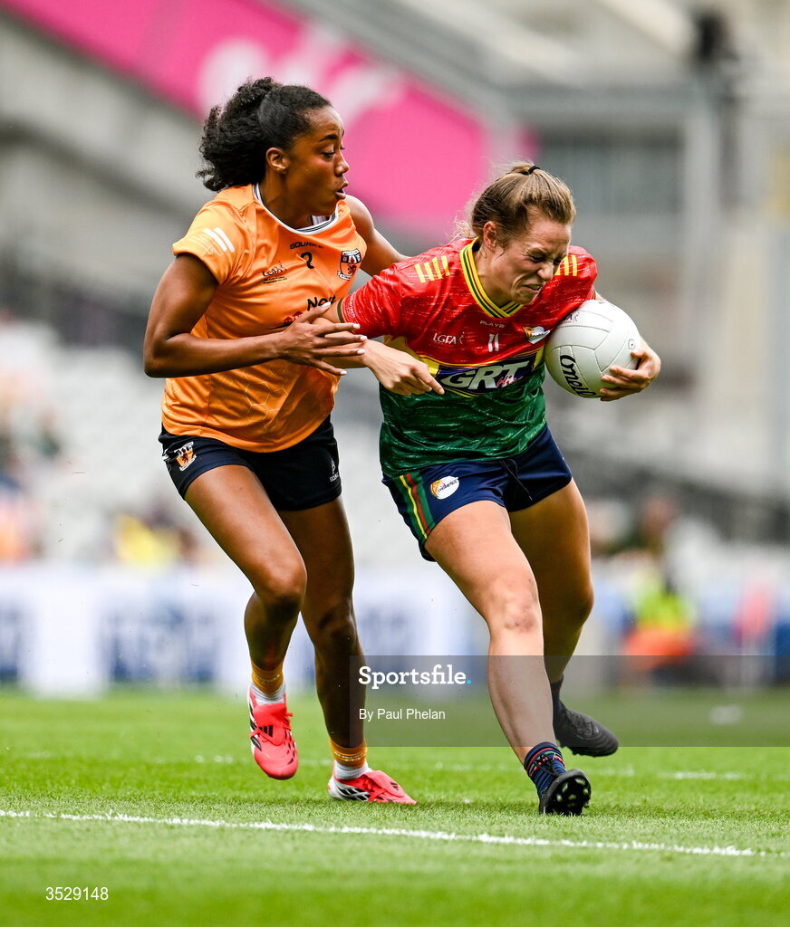 2 August 2026; Clíodhna Ní Shé of Carlow in action against Lara Dahunsi of Antrim during the LGFA TG4 All-Ireland Junior Championship final match between Antrim and Carlow at Croke Park in Dublin. Photo by Paul Phelan/Sportsfile