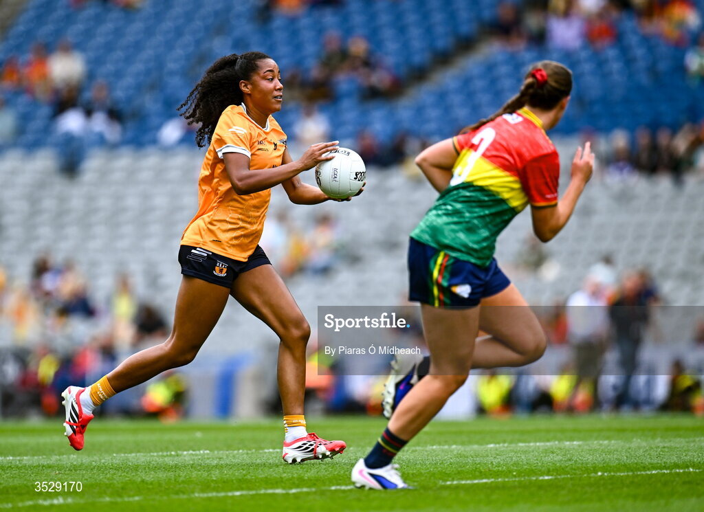 2 August 2026; Lara Dahunsi of Antrim in action against Anne Roche of Carlow during the LGFA TG4 All-Ireland Junior Championship final match between Antrim and Carlow at Croke Park in Dublin. Photo by Piaras Ó Mídheach/Sportsfile