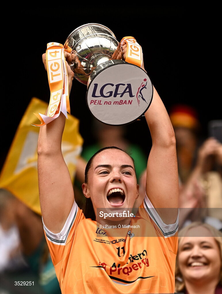 2 August 2026; Bronagh Devlin of Antrim lifts the West County Hotel Cup following the LGFA TG4 All-Ireland Junior Championship final match between Antrim and Carlow at Croke Park in Dublin.