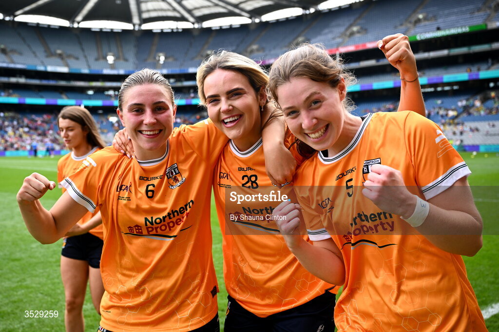 2 August 2026; Antrim players, from left, Dúana Coleman, Aoife Kelly and Laura Agnew celebrate after their side's victory in the LGFA TG4 All-Ireland Junior Championship final match between Antrim and Carlow at Croke Park in Dublin. Photo by Shauna Clinton/Sportsfile