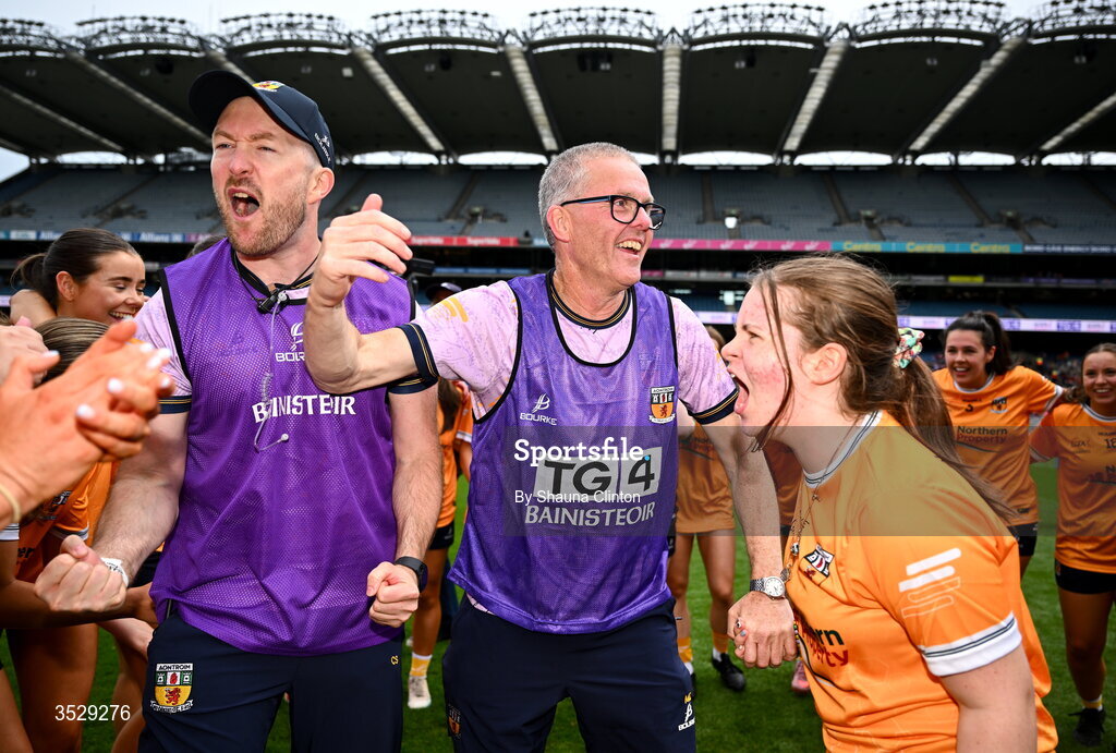 2 August 2026; Antrim manager Chris Scullion, centre, celebrates with players after their side's victory in the LGFA TG4 All-Ireland Junior Championship final match between Antrim and Carlow at Croke Park in Dublin. Photo by Shauna Clinton/Sportsfile