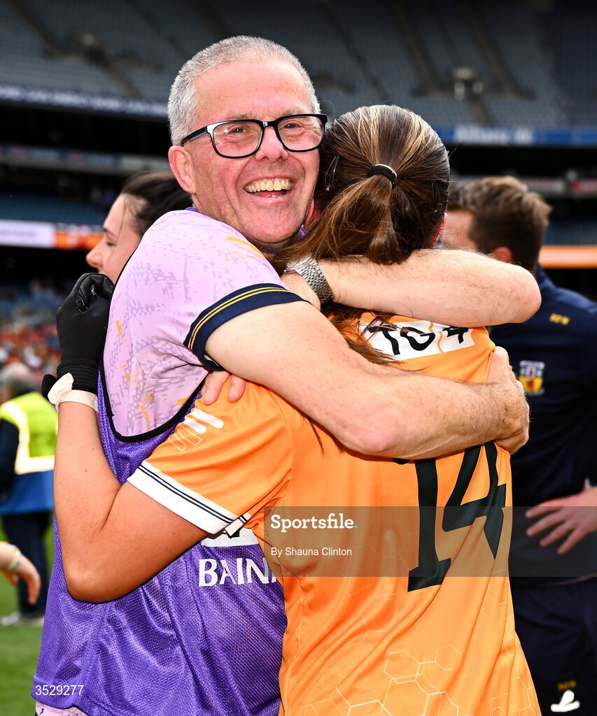 2 August 2026; Antrim manager Chris Scullion celebrates with Maria O'Neill of Antrim after their side's victory in the LGFA TG4 All-Ireland Junior Championship final match between Antrim and Carlow at Croke Park in Dublin. Photo by Shauna Clinton/Sportsfile