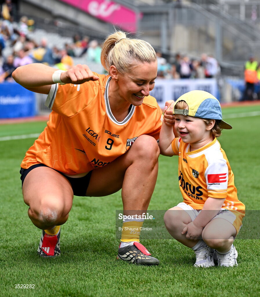 2 August 2026; Áine Tubridy of Antrim and her son Cahir celebrate after their side's victory in the LGFA TG4 All-Ireland Junior Championship final match between Antrim and Carlow at Croke Park in Dublin. Photo by Shauna Clinton/Sportsfile